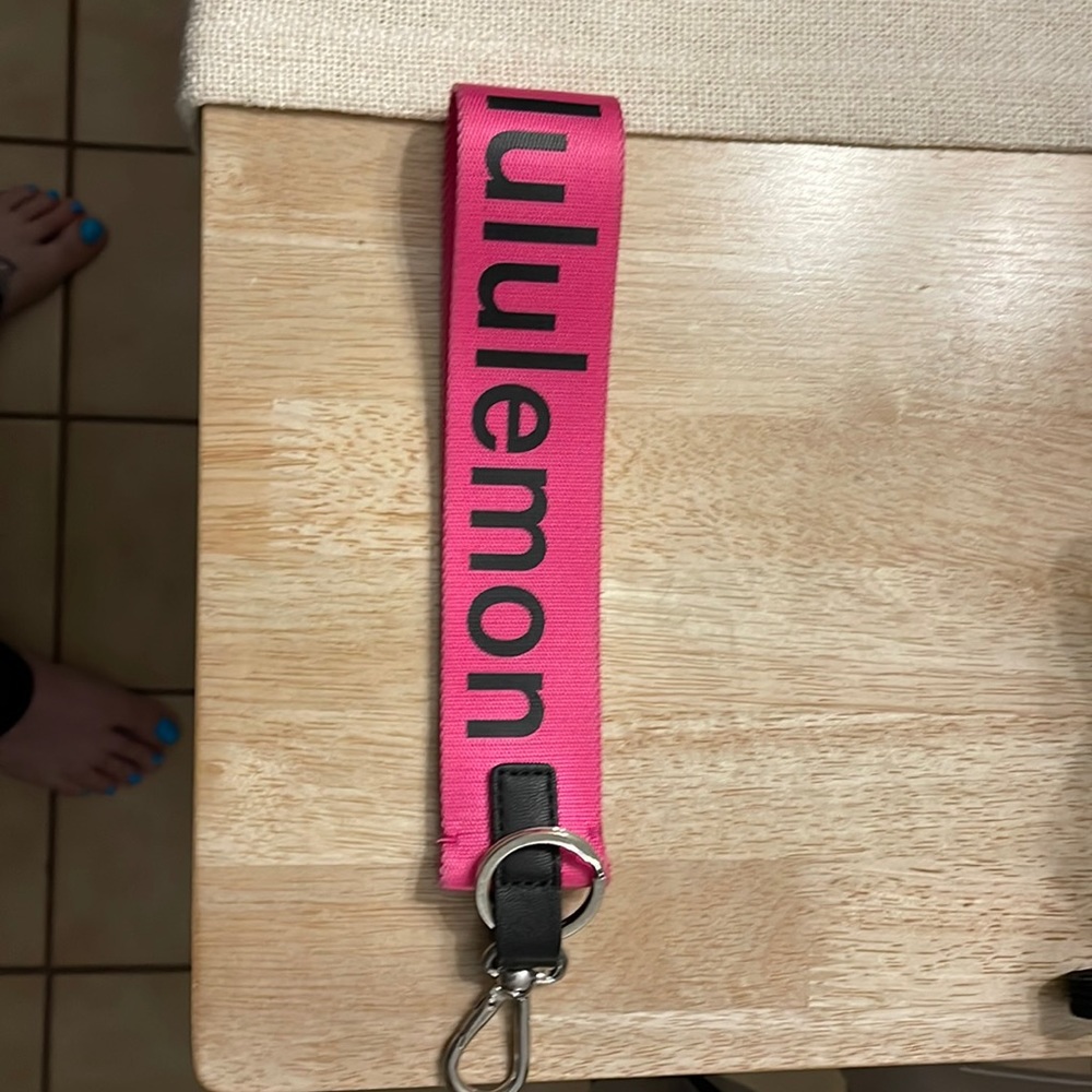 Lululemon Never Lost Key Chain Sonic pink Keychain Like new